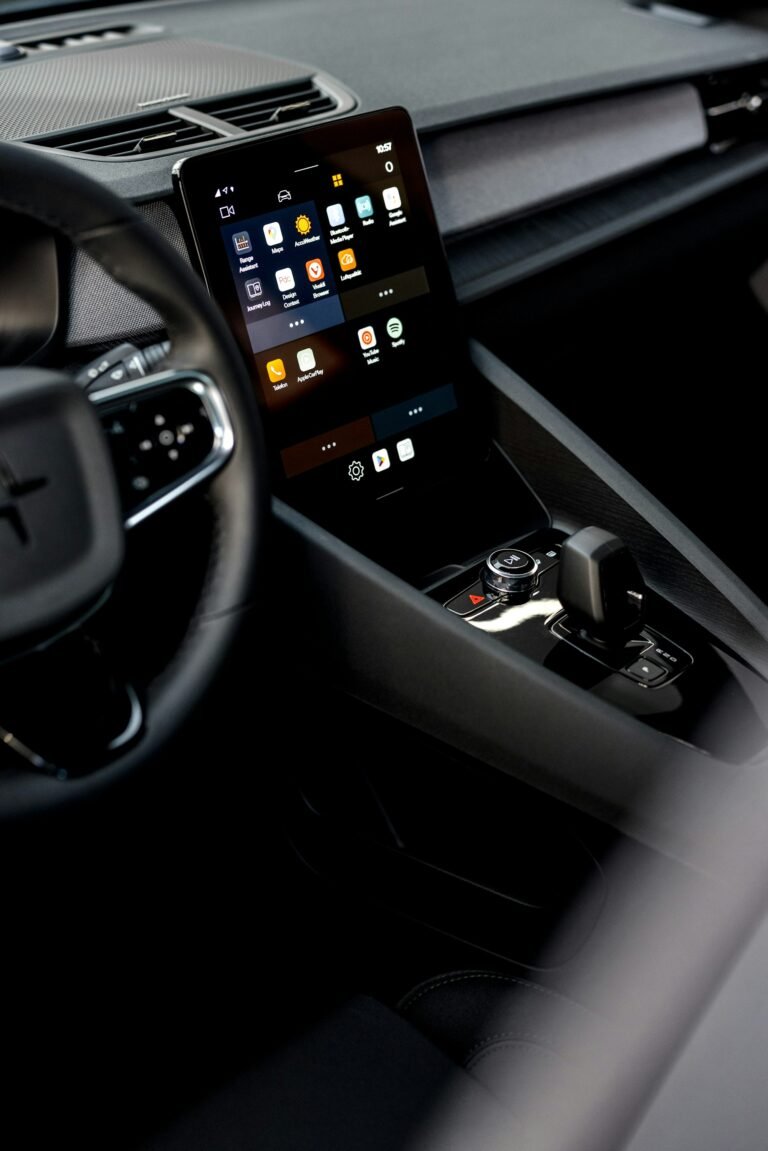 Car dashboard with a digital display representing modern driving technology