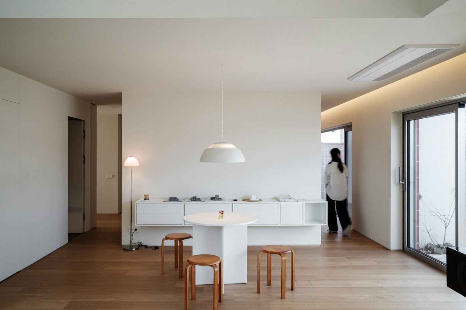 Modern minimalist living room with white furniture